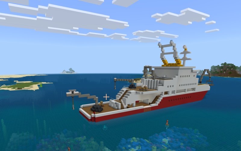 A Minecraft screenshot shows a boat with a crane on it.