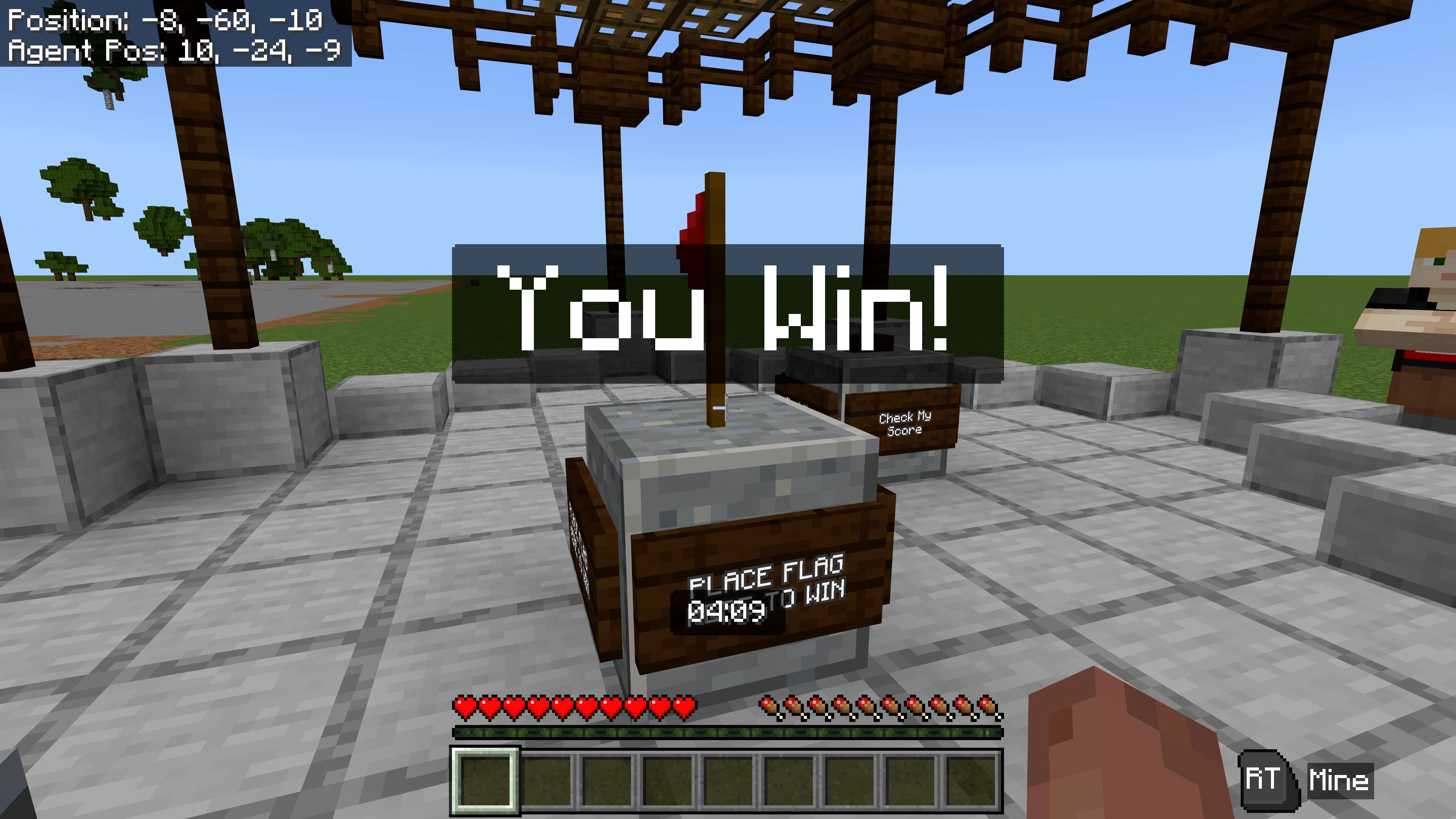A Minecraft game screen shows a winning message after a flag challenge. Text reads: You win!